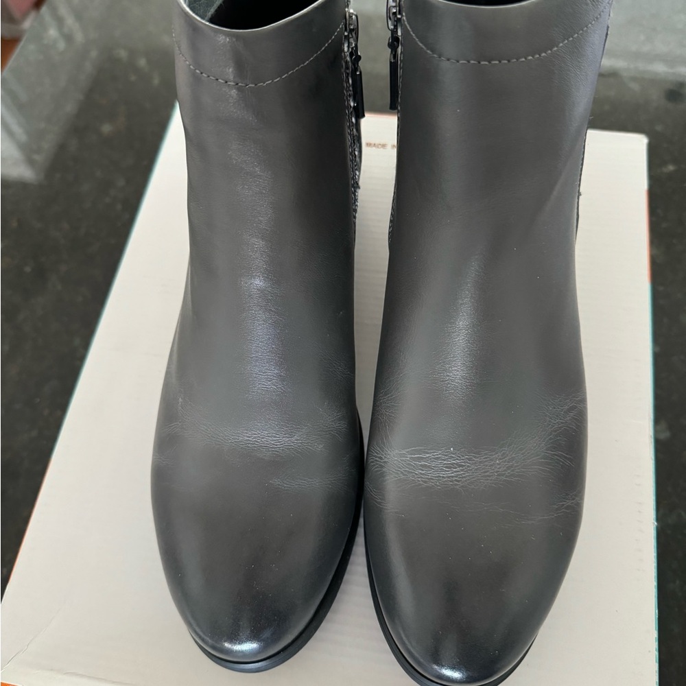 Women’s Propet gray leather ankle boots.